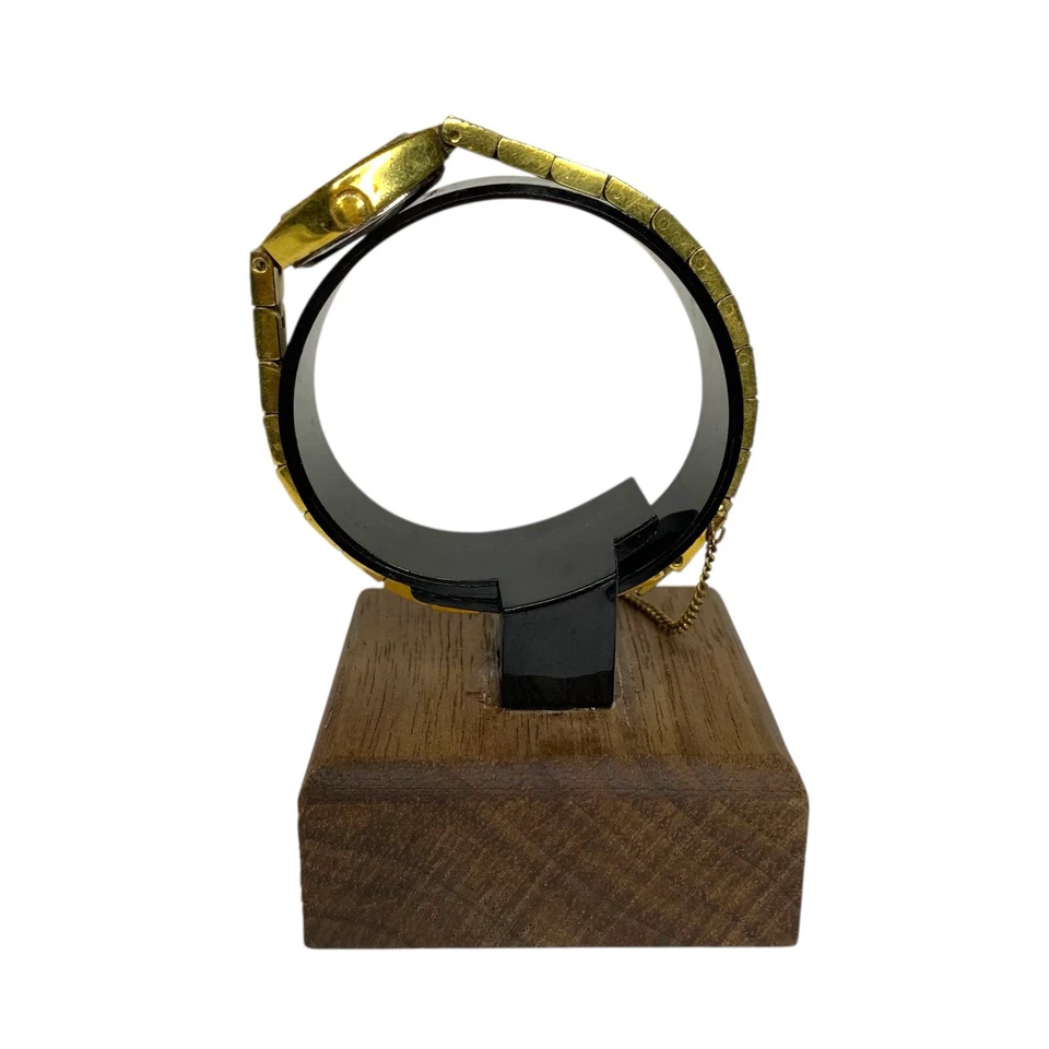 Reloj Accurist chapado en oro vintage para dama LB507B esfera negra ovalada cuarzo funcionando Foto 3 de 4