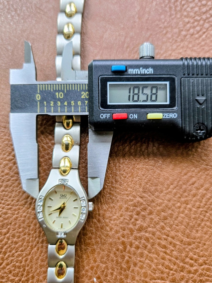 Q&Q (by Citizen) Women’s Watch Two Tone Silver With Gold Accents Bracelet View 4