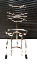 Cat  handmade tv remote cradle stainless steel
