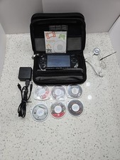 Sony PlayStation Portable PSP -1001 Handheld Cases, Game, and charger.