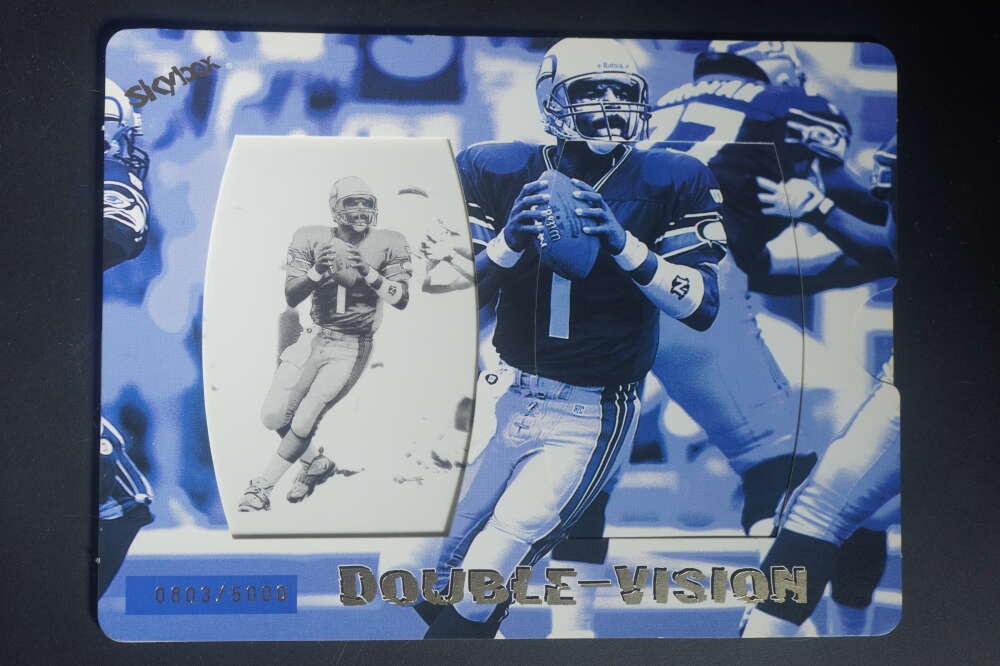 Warren Moon #15 Football Cards 1998 Skybox Double Vision trading card — raw and PSA graded price guide