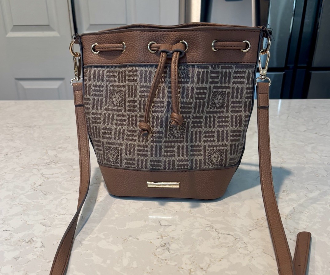 Anne Klein Brown Monogram Bucket Crossbody Bag Drawstring Faux Leather Purse
