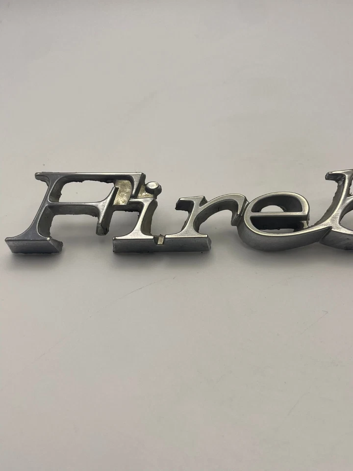 Pontiac Firebird 1971-1981 guardabarros delantero embellecedor lateral emblema de coche OEM cromo genuino Foto 2 de 4