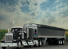 1/64 DCP KENWORTH W900L 60" FLAT TOP W/ WILSON PATRIOT 50' TRI AXLE BELT TRAILER