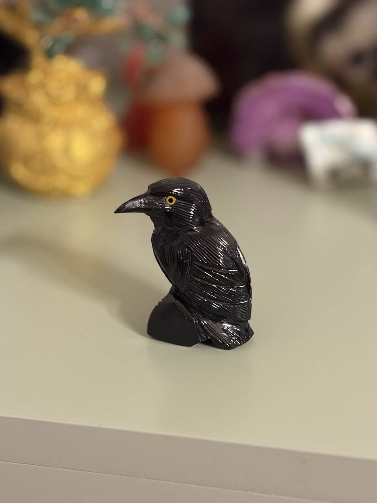 Natural Obsidian Quartz Crystal Carved Crow with Polished Yellow Eyes and Large Beak