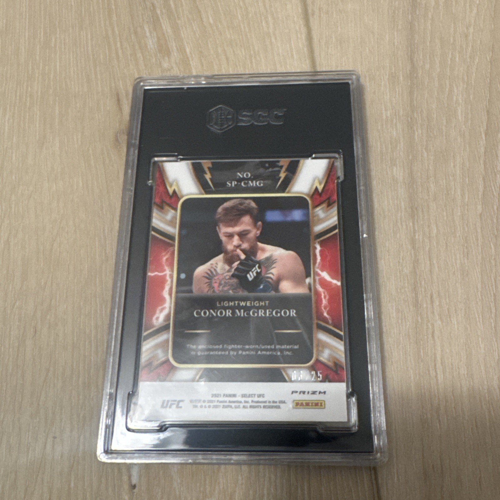 2021 Panini Select UFC Sparks Conor McGregor Relic Tie Dye /25   Blood Stain  view 2