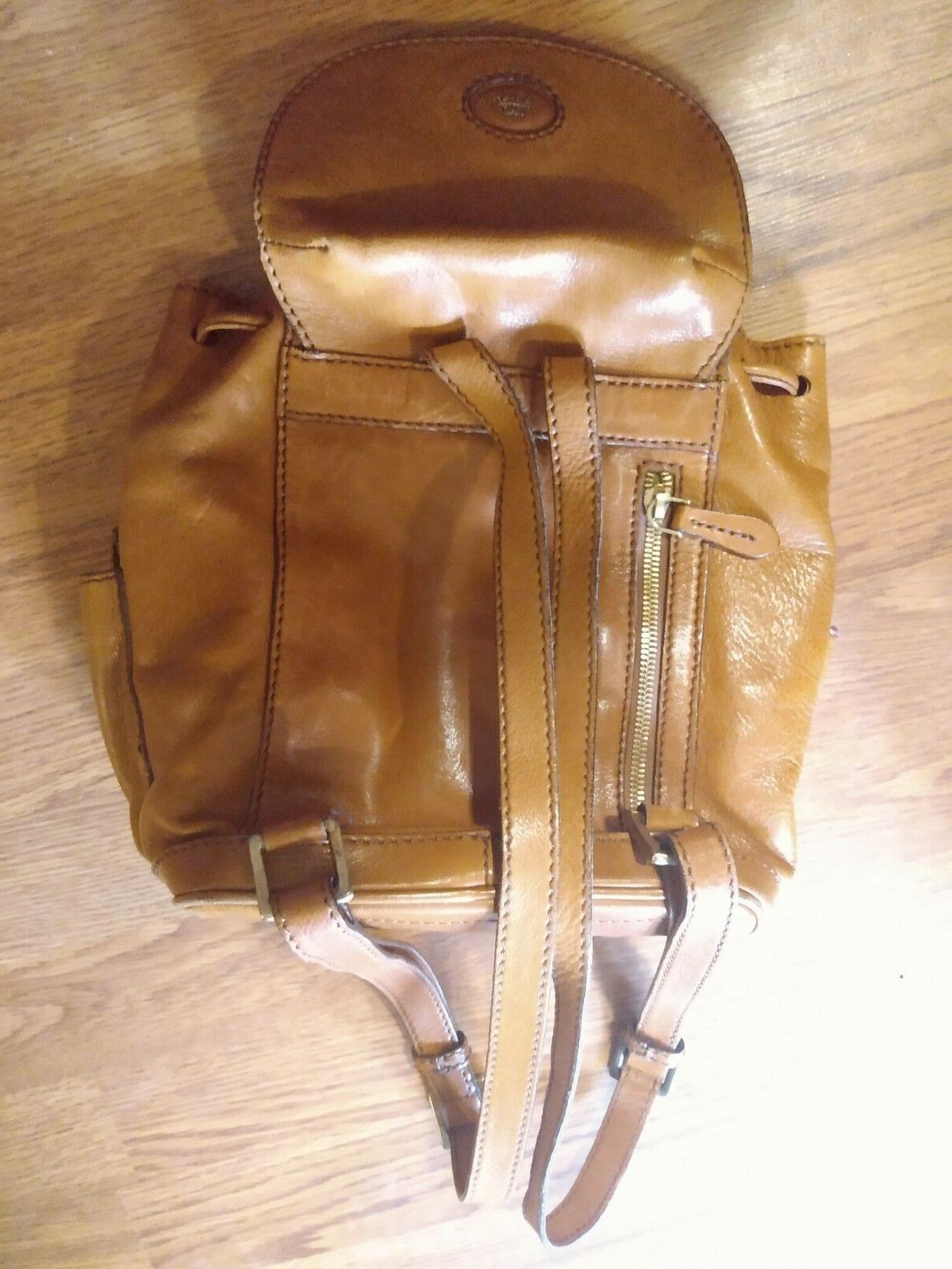 THE BRIDGE handcrafted tan leather backpack brass hardware adjustable straps — image 8