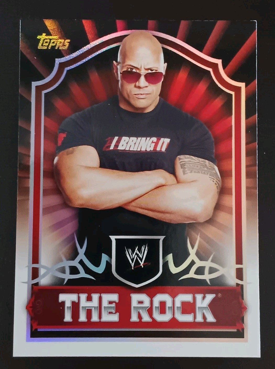 The Rock #57 Wrestling Cards 2011 Topps WWE Classic trading card — raw and PSA graded price guide