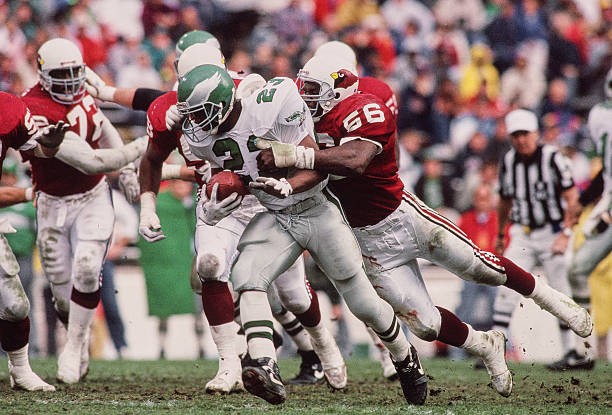 Jim Wahler Nose Tackle for the Phoenix Cardinals reaches to tackle- Old Photo