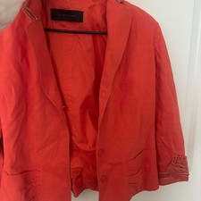 Coral pink blazer with ruffle detailing