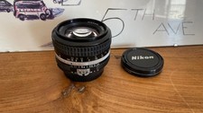 Objectif NIKON 50mm F1,4 AI avec ses bouchons