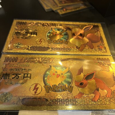 (2) Pokemon Banknote Collectible Featuring Pikachu & Eevee & Flareon Gold Foil