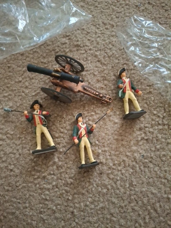 4 Vintage Metal Toy Soldiers Brittish Dress Uniforms Hand Cannon Red White Blue.