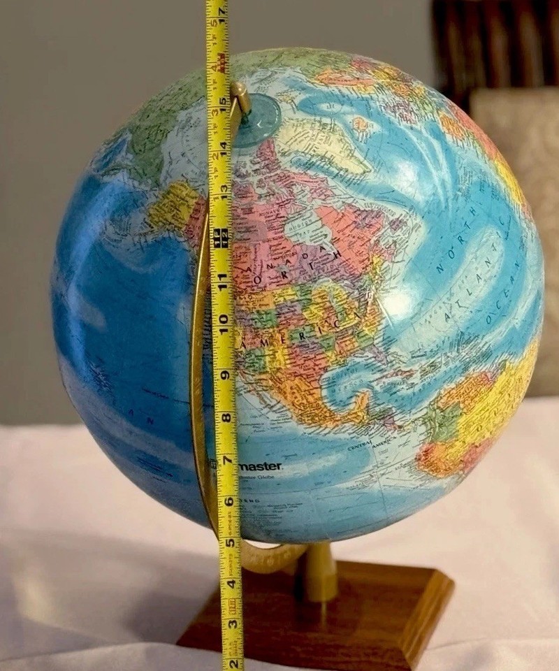 A handsome 16" Globemaster with a real wood base — Made in USA craftsmanship that modern globes simply don't replicate.