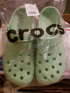 mint green crocs