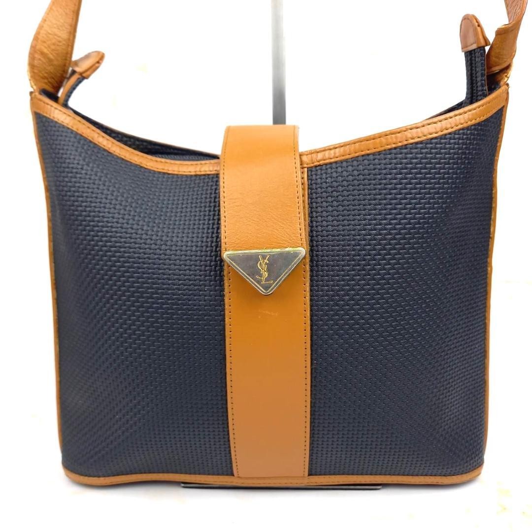 Borsa a tracolla Yves Saint Laurent vintage in pelle secchiello marrone nero YSL Cassandra