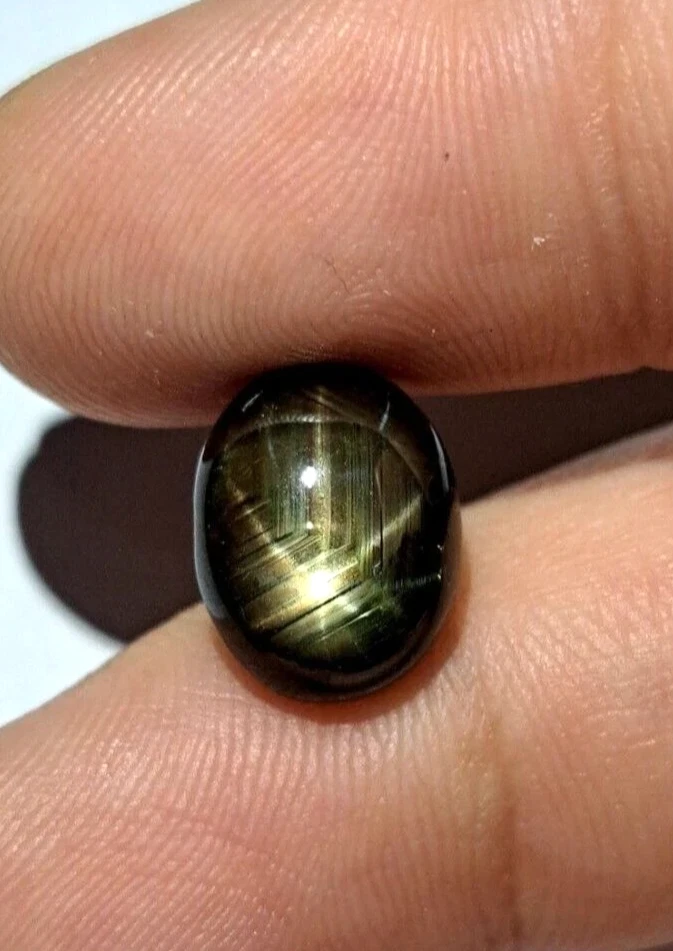 Piedra preciosa suelta cabujón ovalado 6 rayos zafiro estrella negro natural 11 quilates + Foto 2 de 4