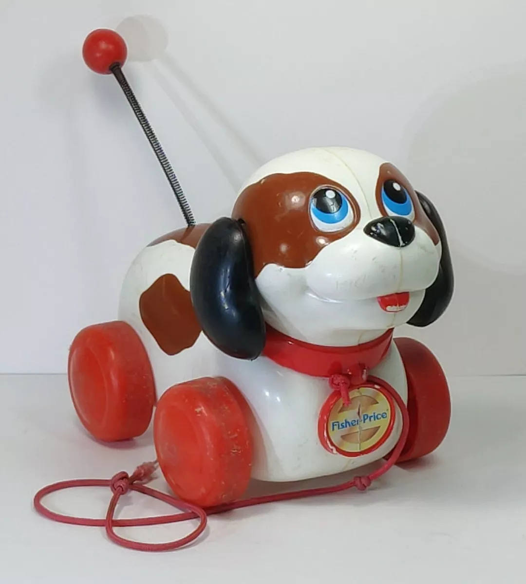 Fisher price pull 2025 dog vintage