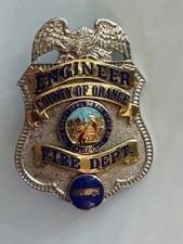 VINTAGE COUNTY OF ORANGE CALIFORNIA FIRE DEPT ENGINEER BADGE OBSOLETE 2 1/4