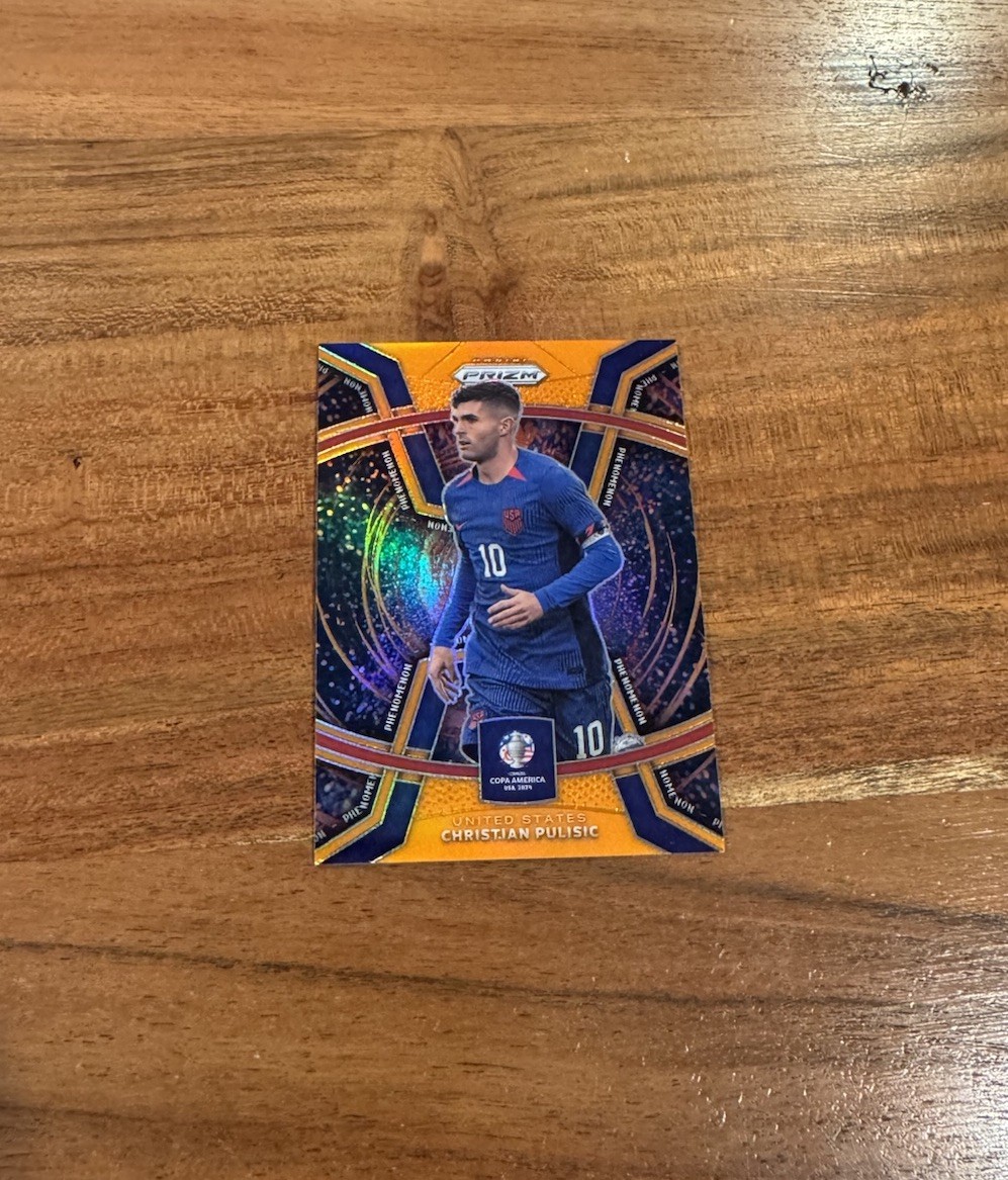 Christian Pulisic 2024 Panini Copa America Phenomenon Orange Prizm /25 NRMT+ USA