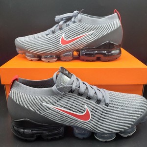 grey and red vapormax