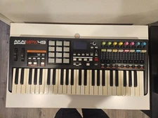 Black Akai MPK49 Keyboard and Drum Pad Controller