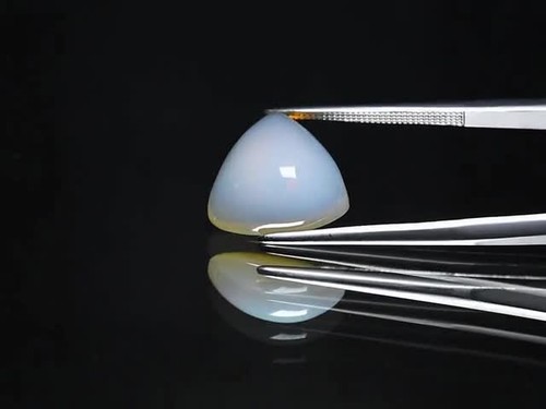 π 3.94ct Triangle Cabochon Natural White Opal - Color Flash, Ethiopia Gem - Video 1 of 1