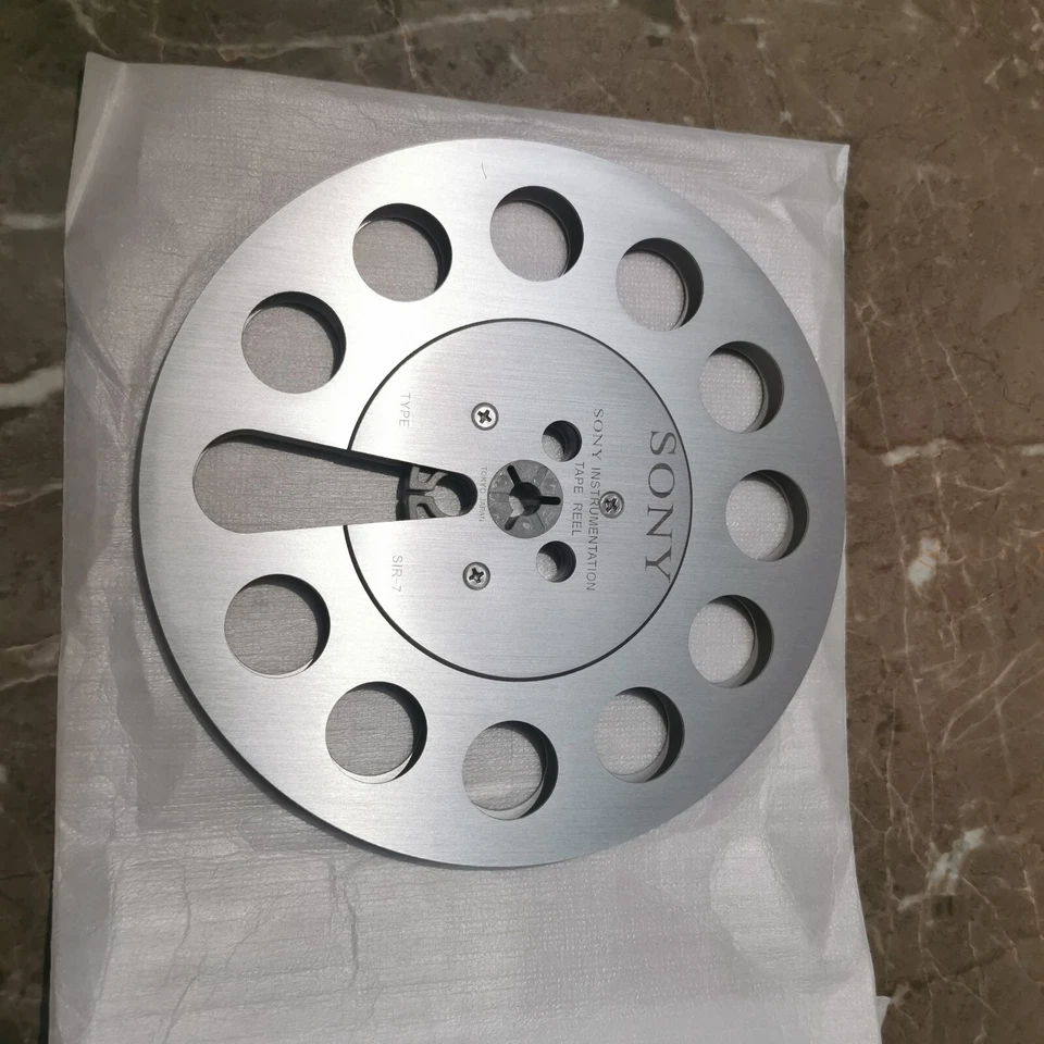 Un par de carretes de cinta plateados Sony 7" pulgadas metal claro aluminio carrete de recogida Foto 2 de 3