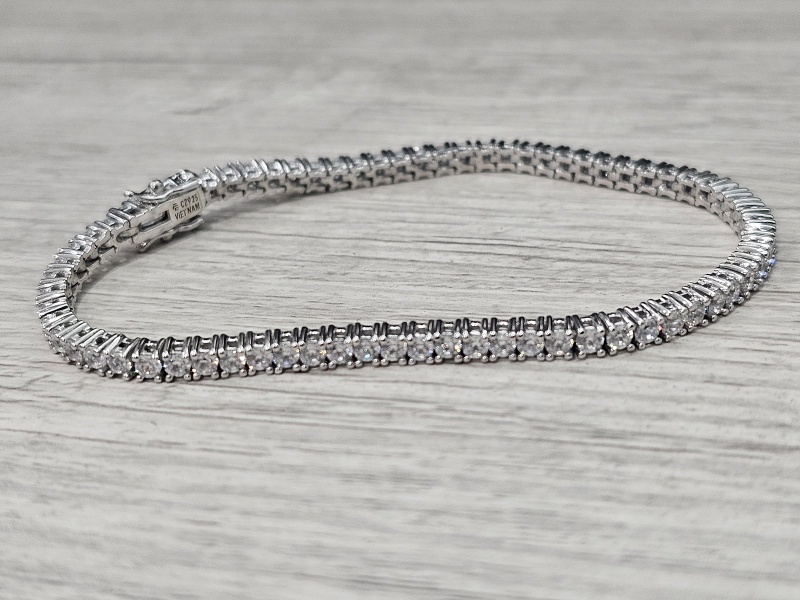 QVC Diamonique Sterling Silver 100-Facet Tennis Bracelet Platinum Clad 7.5"