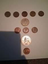 Collection Of Assorted Coins Dated 1979-1982. Coins Vary In Condition.