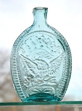 Historical Flask: An American Eagle with a Banner and Stars is on both sides.