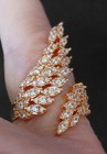 Fashion Ring Leaf Shape With Multiple Clear Stones Accenting The Leafs. Size 6-7 — photo 1