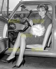 Photo - Mandy Rice-Davies candid portrait, at London Airport in 1964 (1)