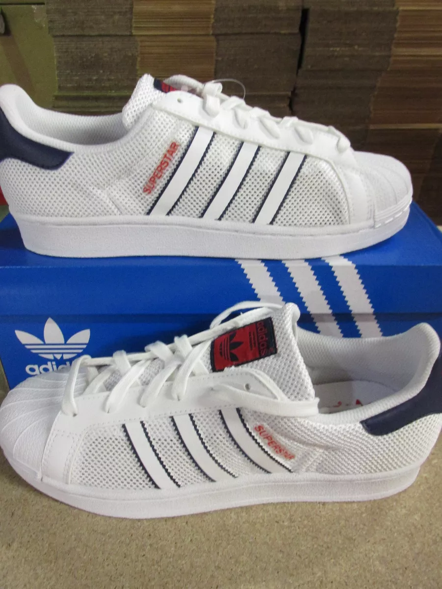 Adidas superstar white red and blue hotsell stripe trainers