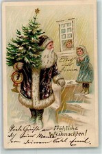 13480119 - Brown coat with fur trim, Christmas tree postcard Santa Claus 1905