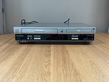 Panasonic NV-VP33 VHS VCR and DVD Combo Player. Silver with Remote and Cables.
