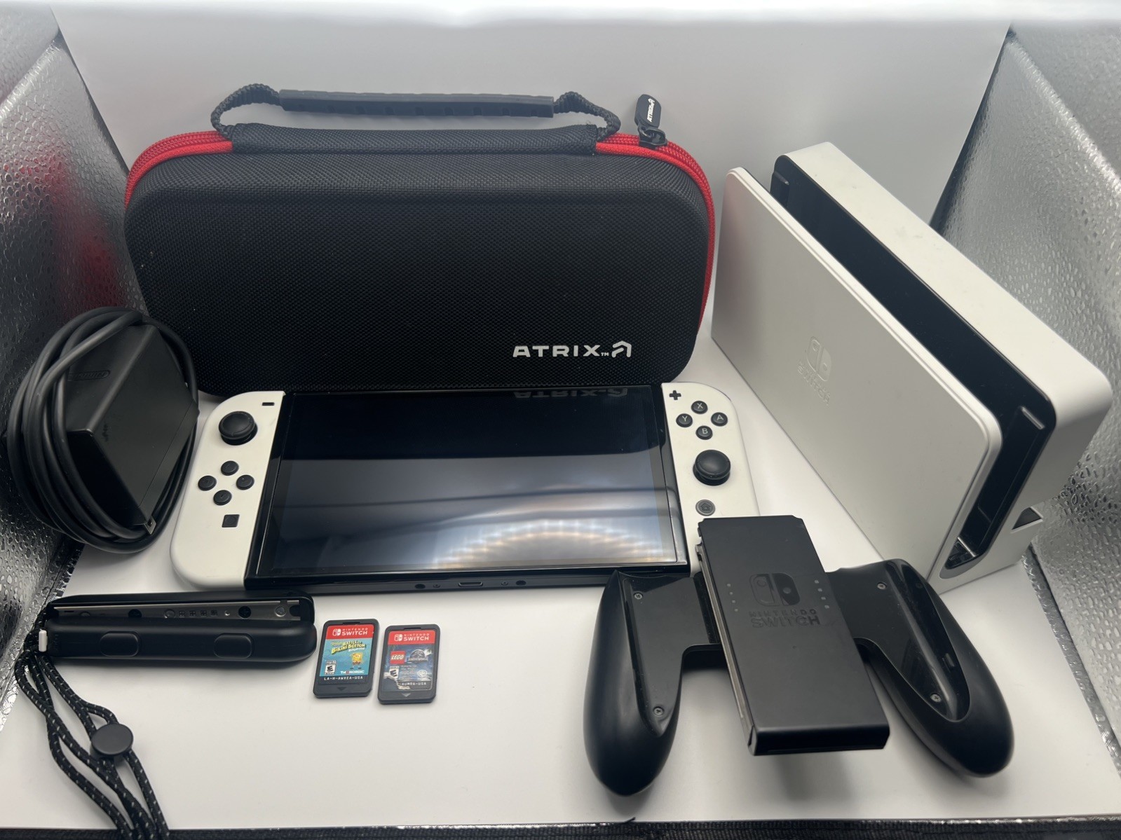 NINTENDO SWITCH HANDHELD -OLED -HAC-016 BUNDLE GAMES SWITCH CASE DOCK CONTROLLER