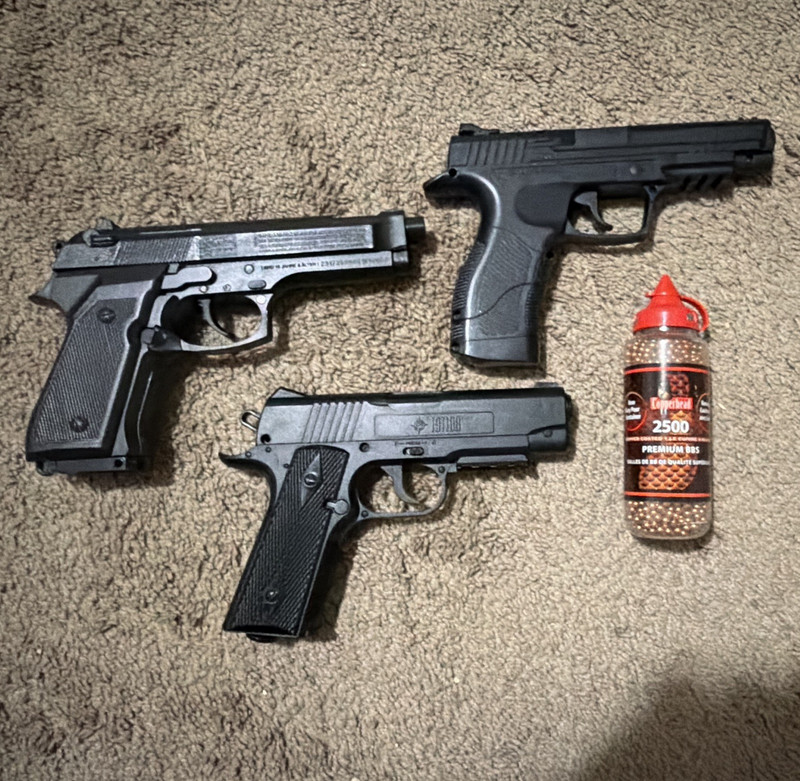 Lot of 3 Spring Airsoft-Style Pistols with BB Bottle, Pistol Model