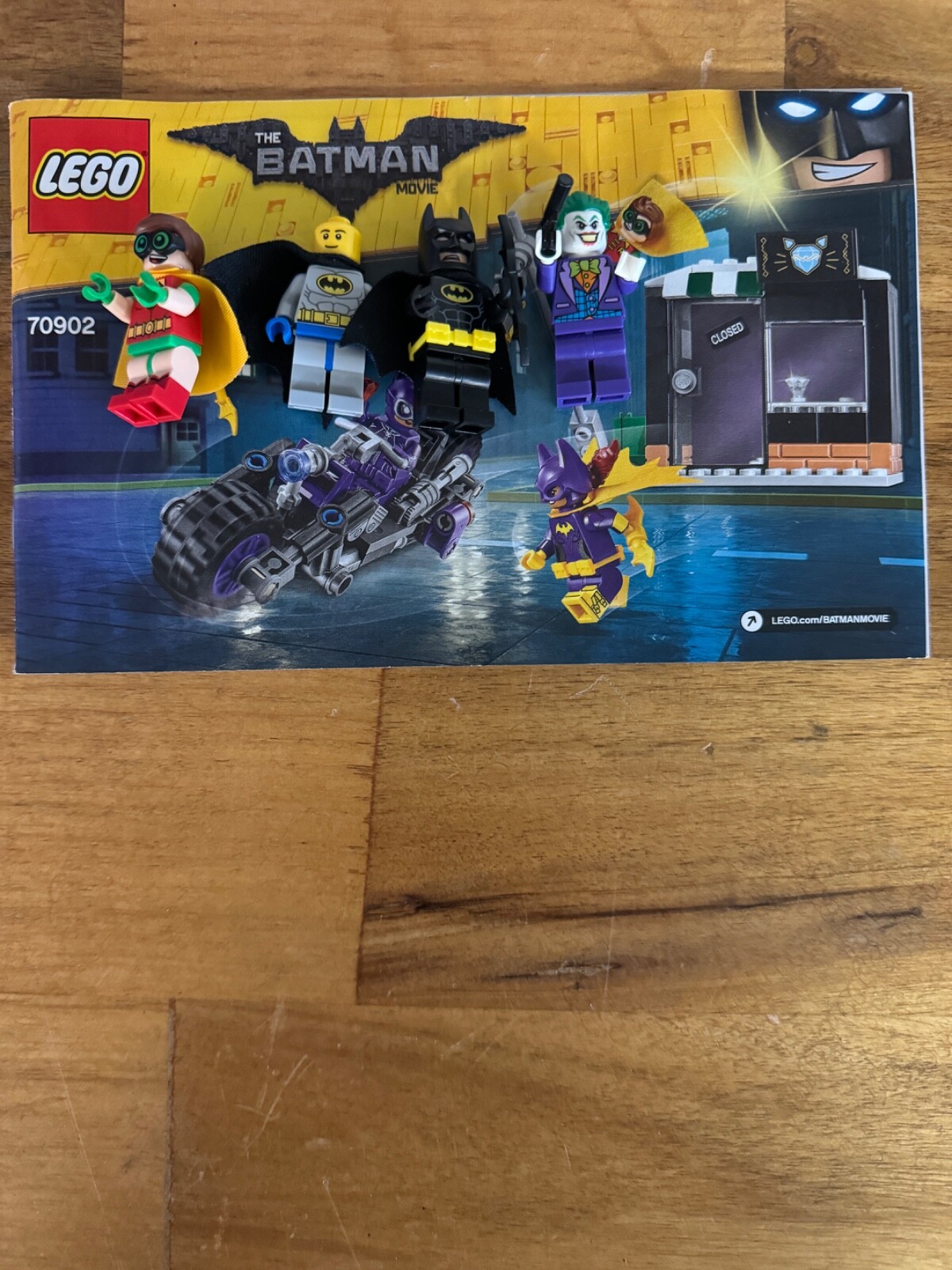 4 mini legos batman related and booklet