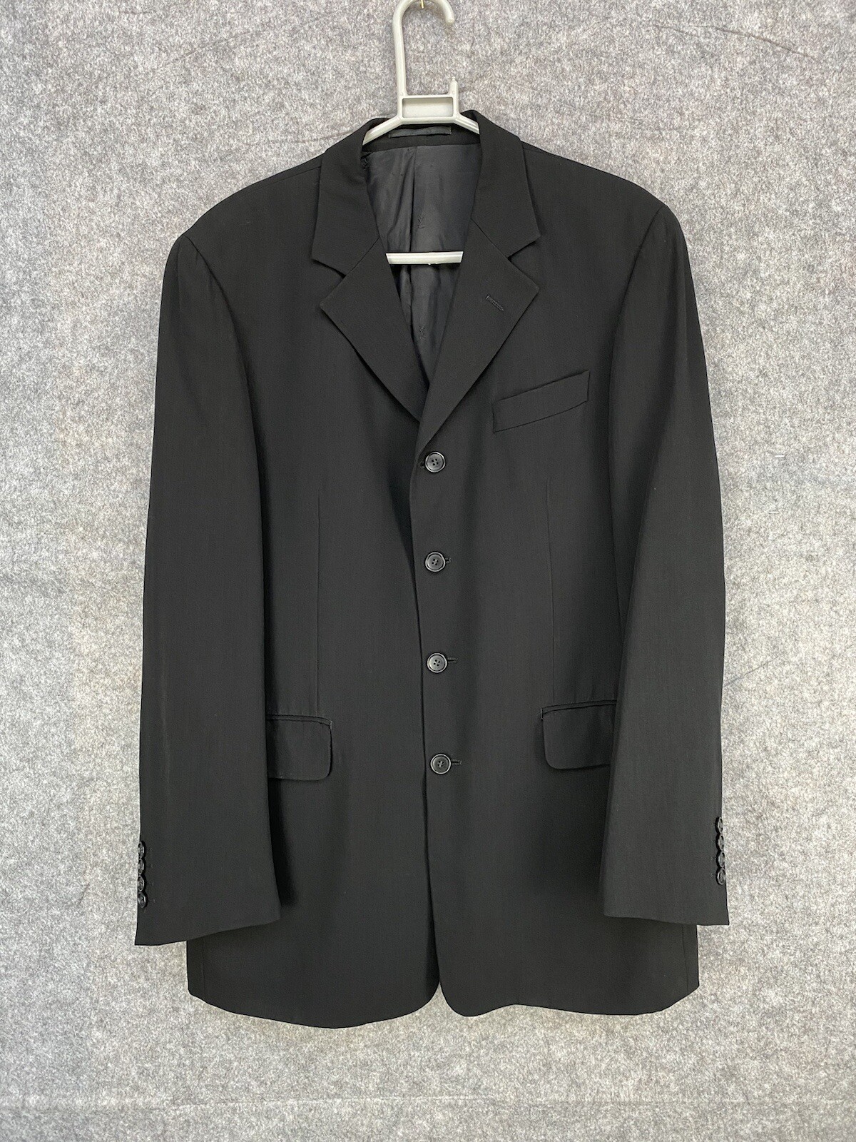 Giacca Yves Saint Laurent pura lana nera taglia 50L design alta qualità 4 bottoni