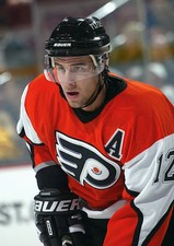 Simon Gagne Philadelphia Flyers skates at the NHL game with - Ice Hockey Photo