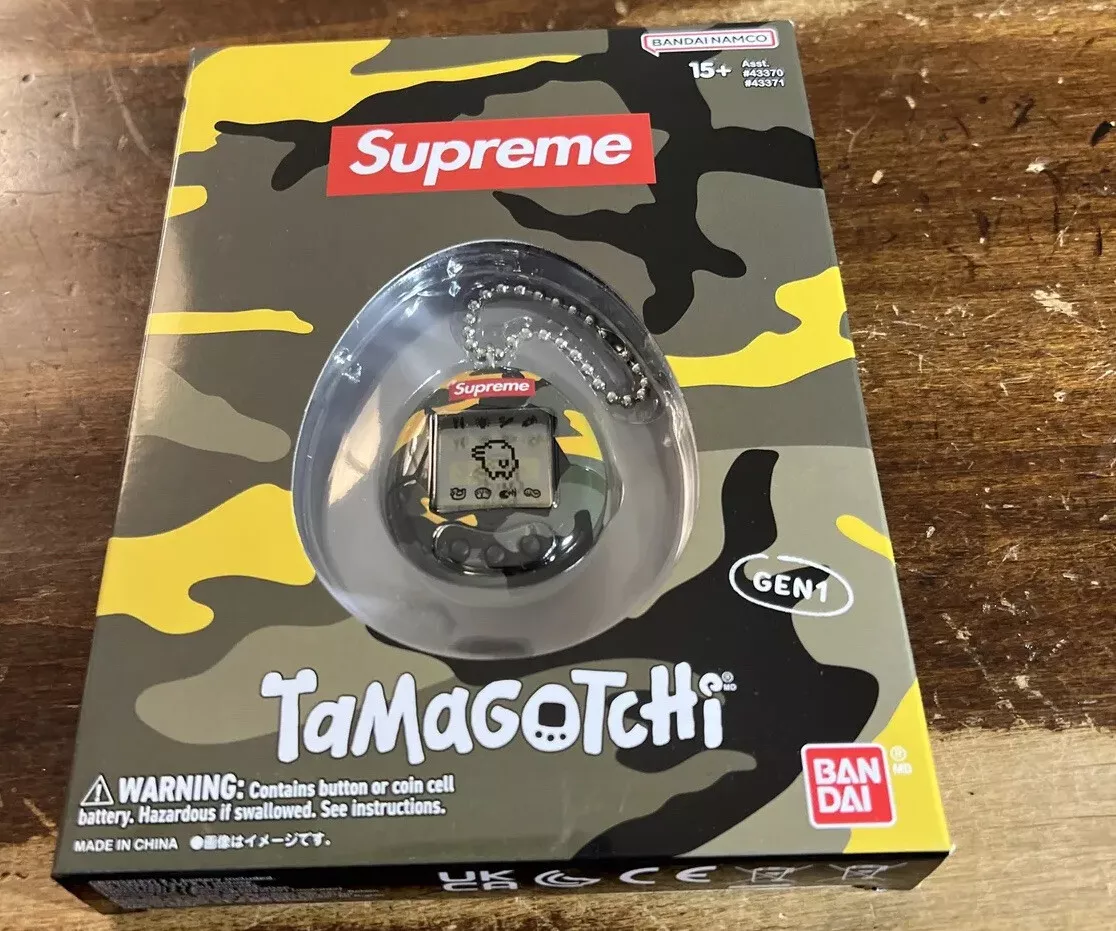 SUPREME/TAMAGOTCHI YELLOW (100% AUTHENTIC) (BRAND NEW) SS23 WEEK 4