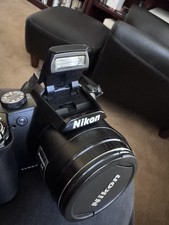 Nikon Coolpix P90 12.1MP Digital Camera 24x Optical Zoom, battery, charger