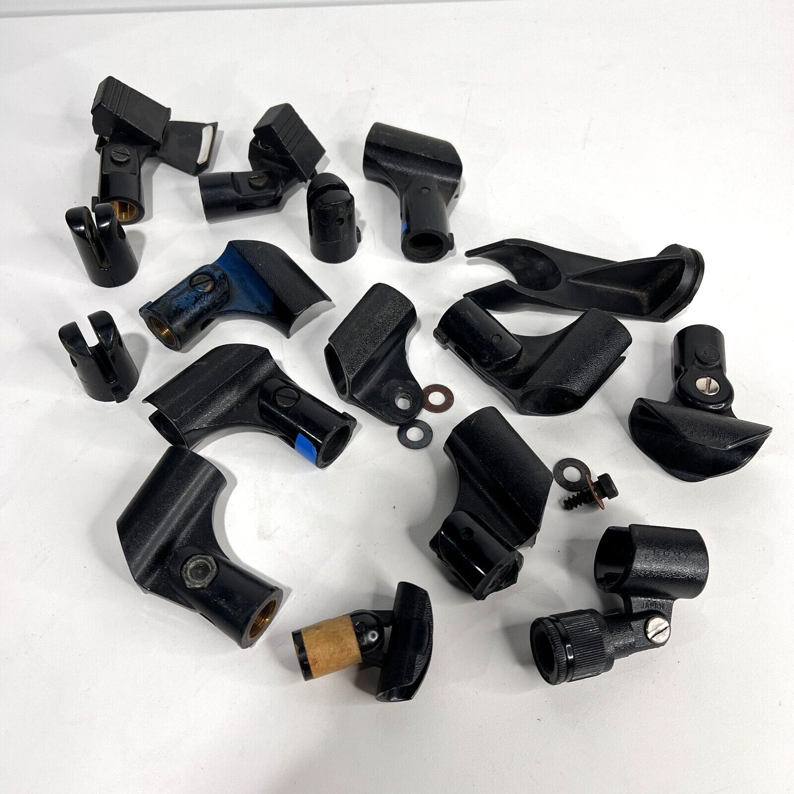 LOT of used Mic clips and parts hardware - Shure Brothers Sony more