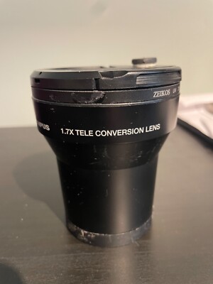 olympus 1.7x tele conversion lens, zeikos UV 77mm with cap