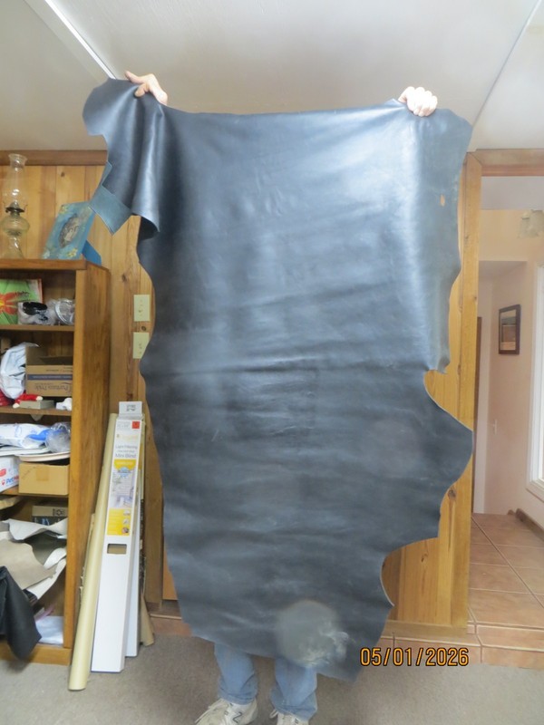 Large piece of black cow leather, 56in long by 32in wide