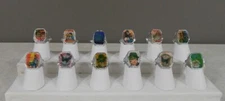 Complete Set of 12 1960’s Vari-Vue Green Hornet Flicker Rings