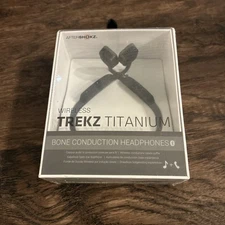 New In Box Unopened Aftershocks Wireless Trekz Titanium Headphones Gray