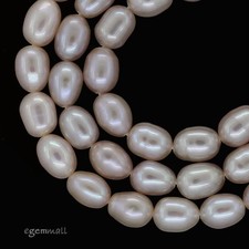 Peach Freshwater Pearl Rice Oval Beads ap.6.5mm 66183