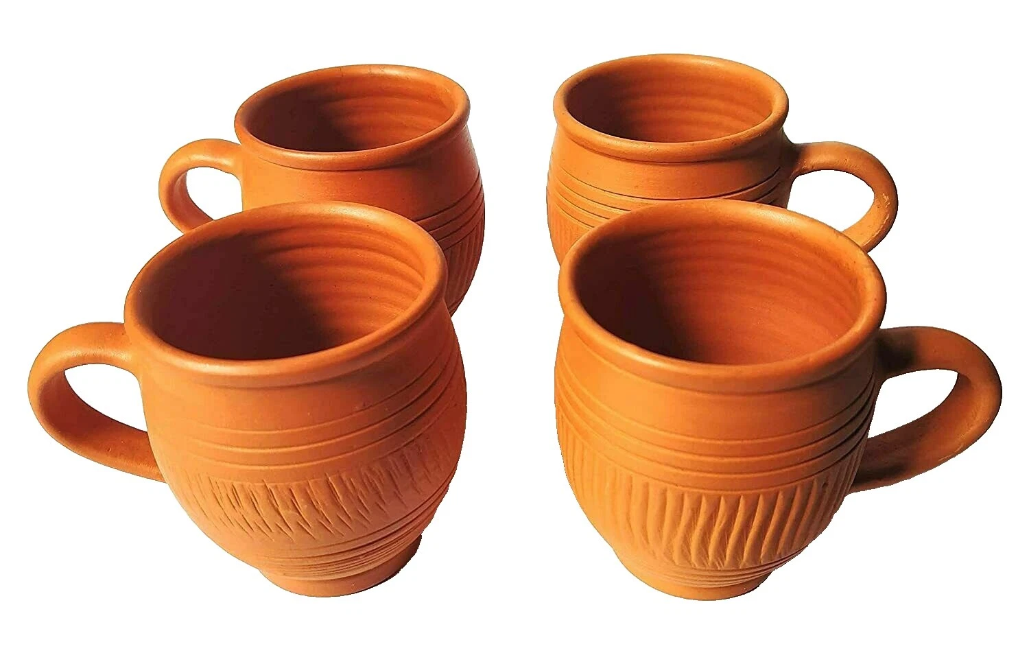 Tazas y platillos marrón de cerámica